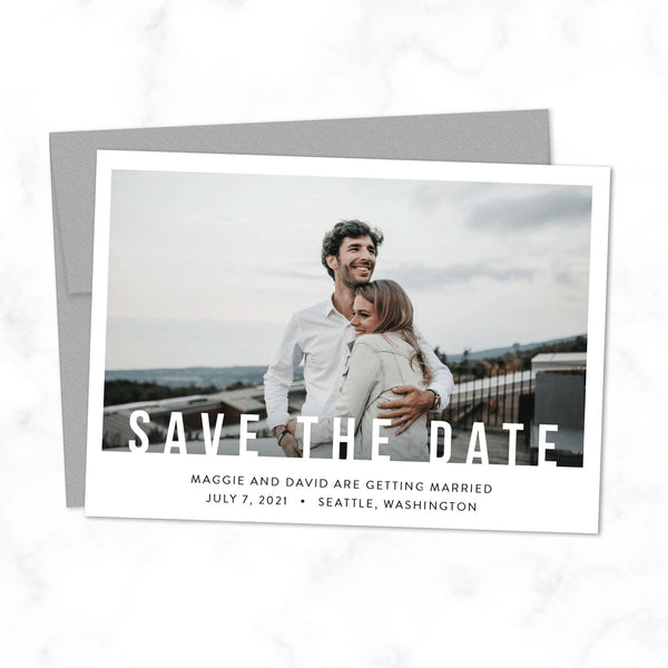 Minimal Save the Date Card with Photo and Modern Bold Typography shown with Silver Envelope