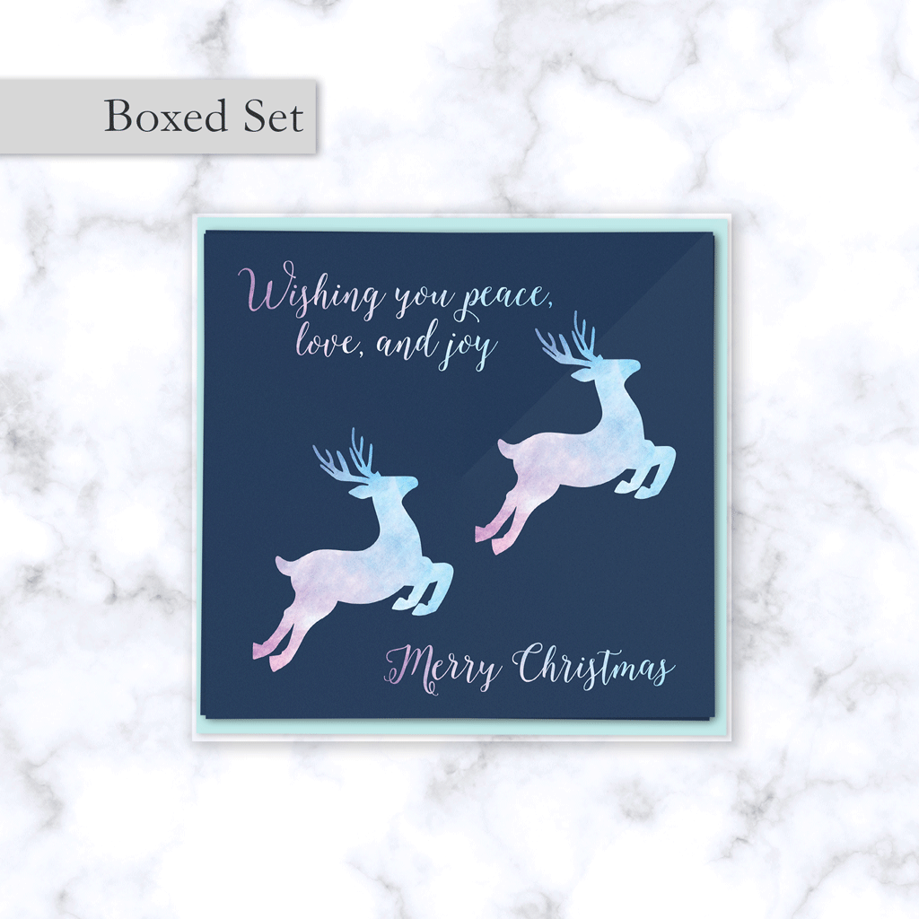 Leaping Reindeer Boxed Christmas Card Set with Watercolor Textured Reindeer in Pink and Blue - Envelope Included
