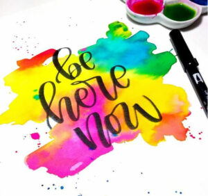 Be here now rainbow wash watercolor lettering